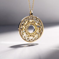 Sri Lanka / circle of life / 18-karat gold / enhanced with 20 diamonds